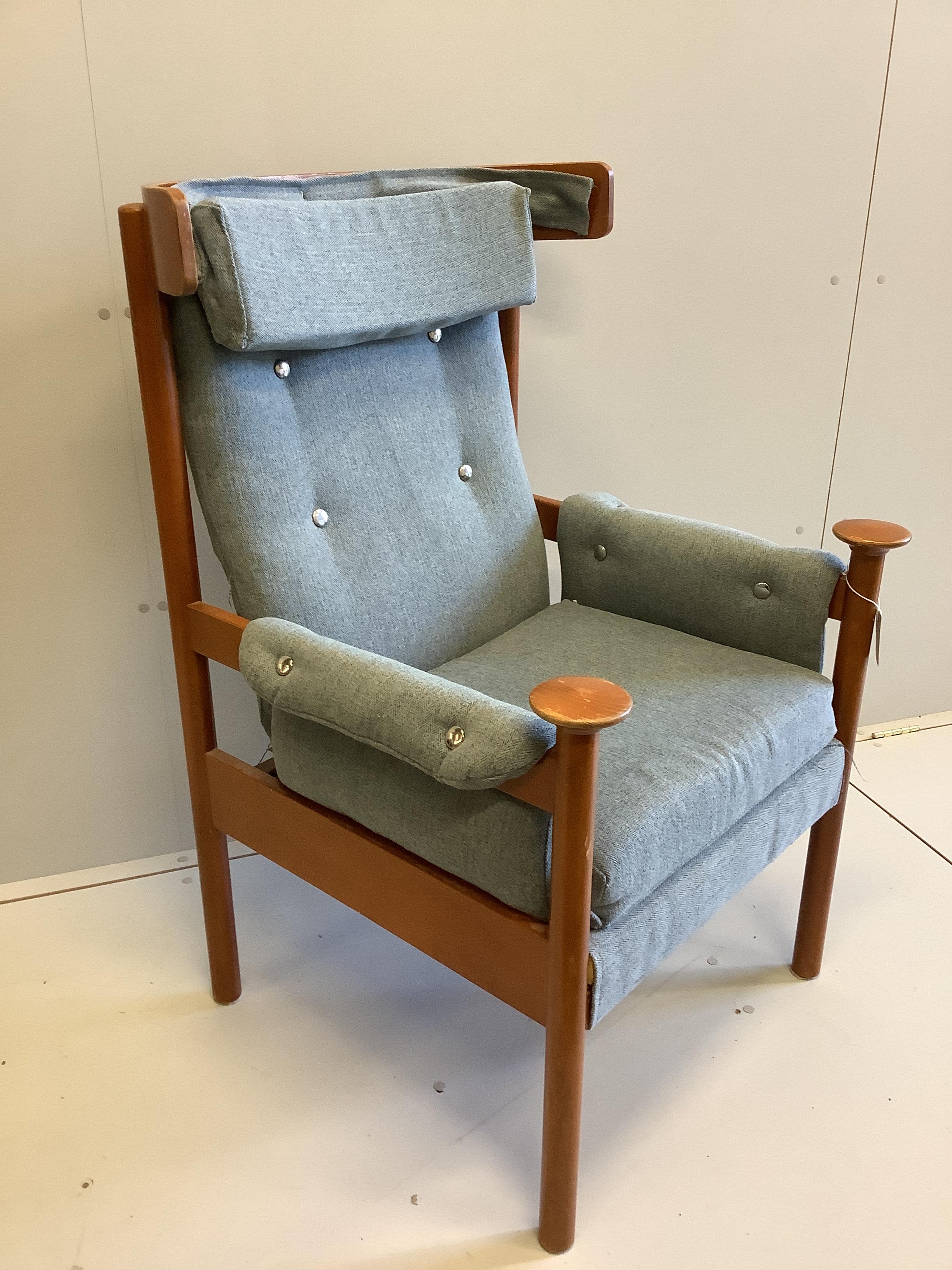 A mid century Parker Knoll upholstered beech “Bwana” style armchair, width 71cm, depth 65cm, height 108cm